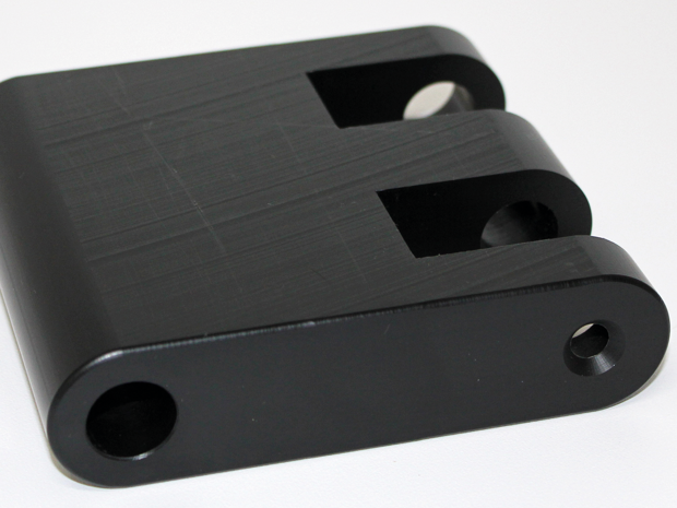 Parallelmekanisme i sort POM plast til fødevareproduktion