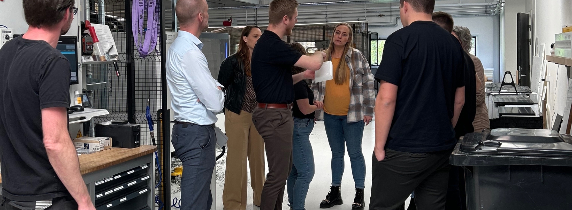 Technical salesperson talks about the production of plastic machine parts.