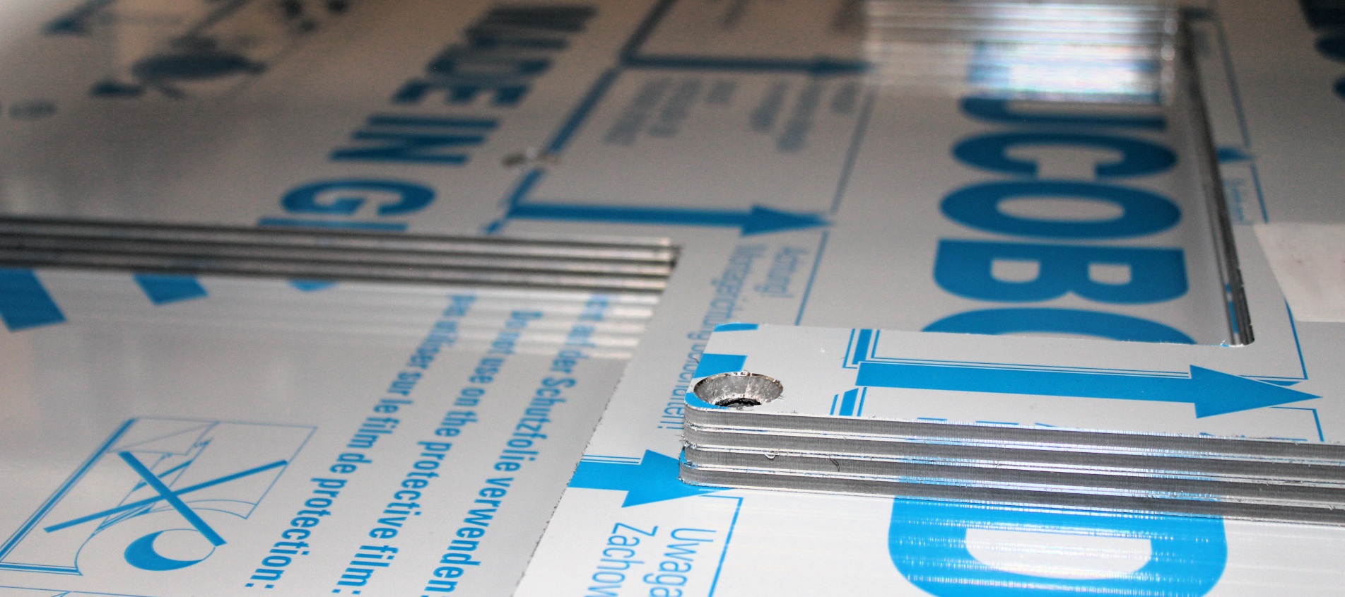 Aluminum sandwich panels are especially good for covering machines.