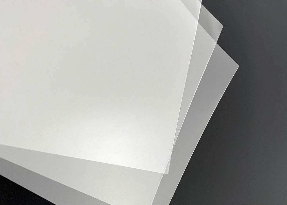 Sheets of clear PET on a black background