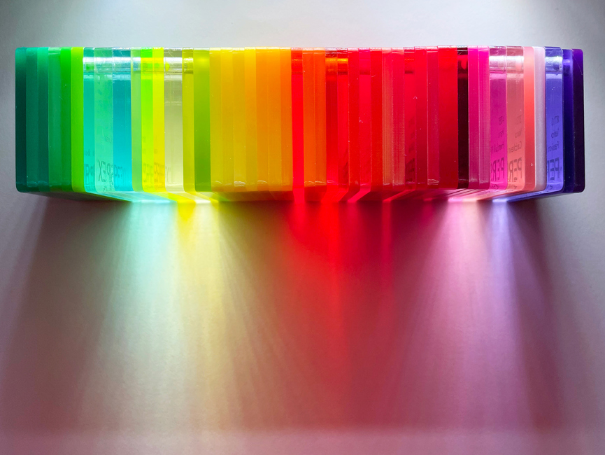 A range of acrylic samples in colours including green, yellow, red and purple