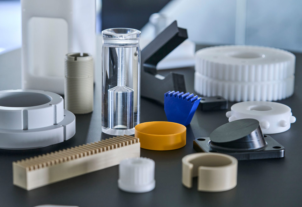 Machine parts of engineering plastics as PEEK, POM and nylon.