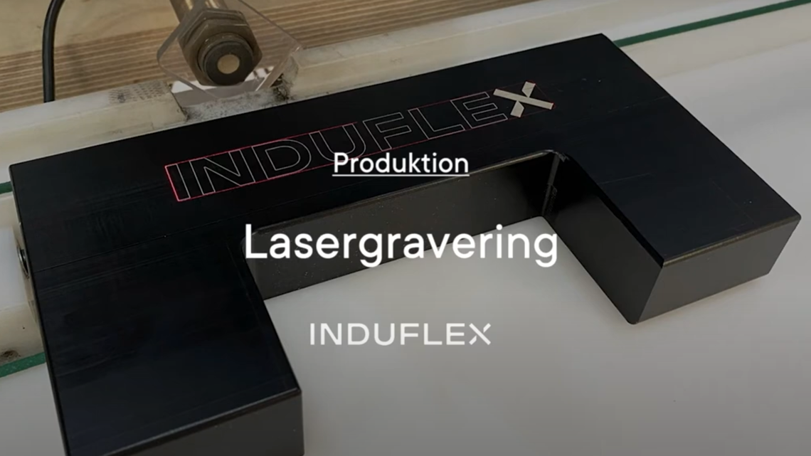 Eksempel på gravering med laser på POM-emne.