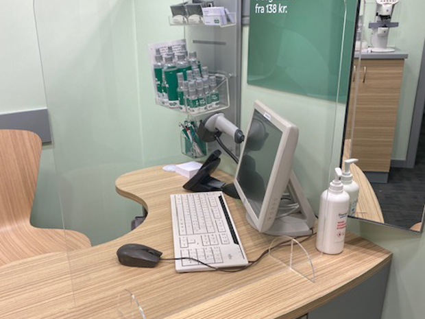 Partition screens in clear plastic on a table in a store