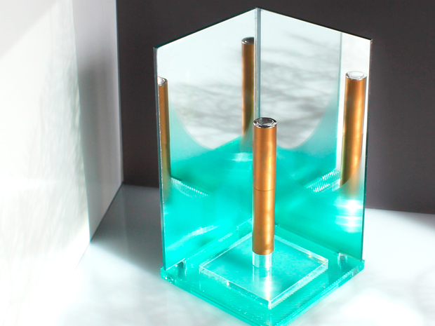 Make-up display for perfume in mirrored acrylic