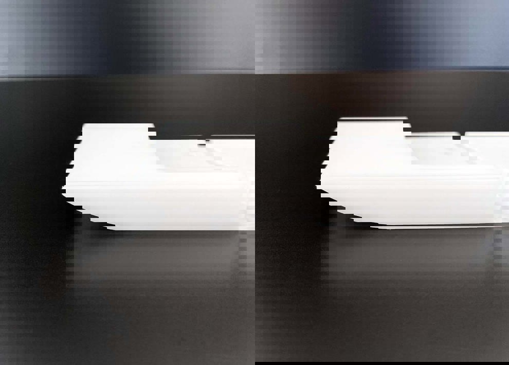 Plastic part milled from white POM plastic