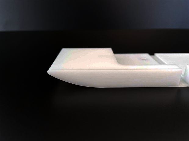 Plastic part milled from white POM plastic