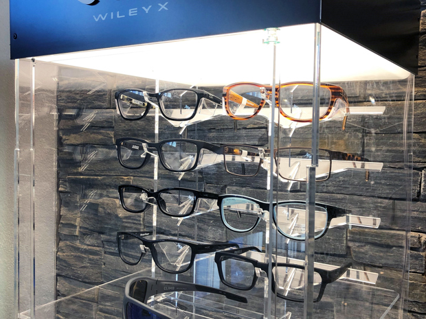 Store display with light and logo for glasses